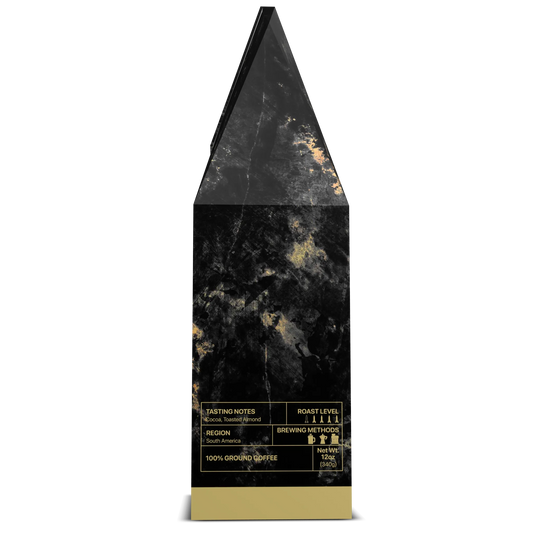 Side view of Apache Roast, AH-64 ground roast by USMIL Coffee. Taste profile chart on black and gold box.