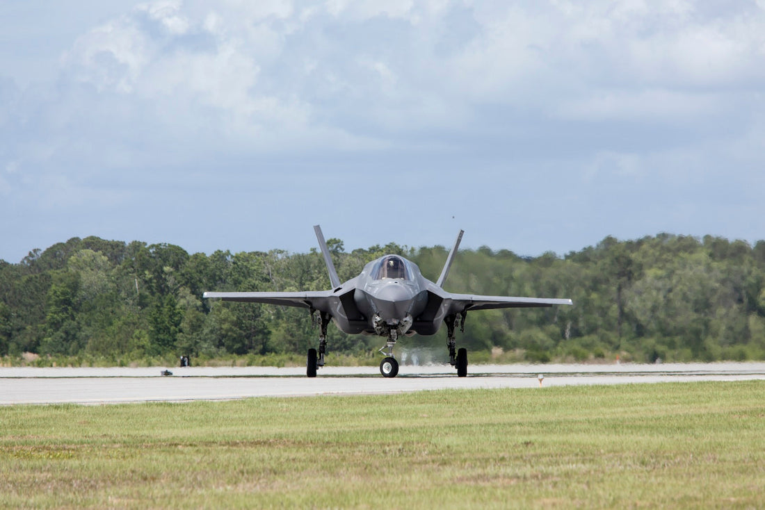 F-35 Lightning II fighter jet on tarmac inspiring USMIL Coffee's Lightning Roast medium blend