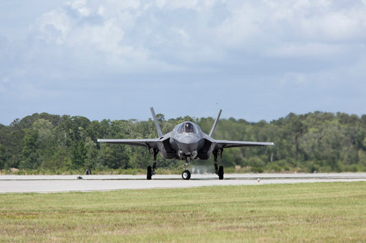 F-35 Lightning II fighter jet on tarmac inspiring USMIL Coffee's Lightning Roast medium blend